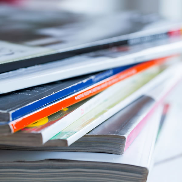 Pile of colourful magazines